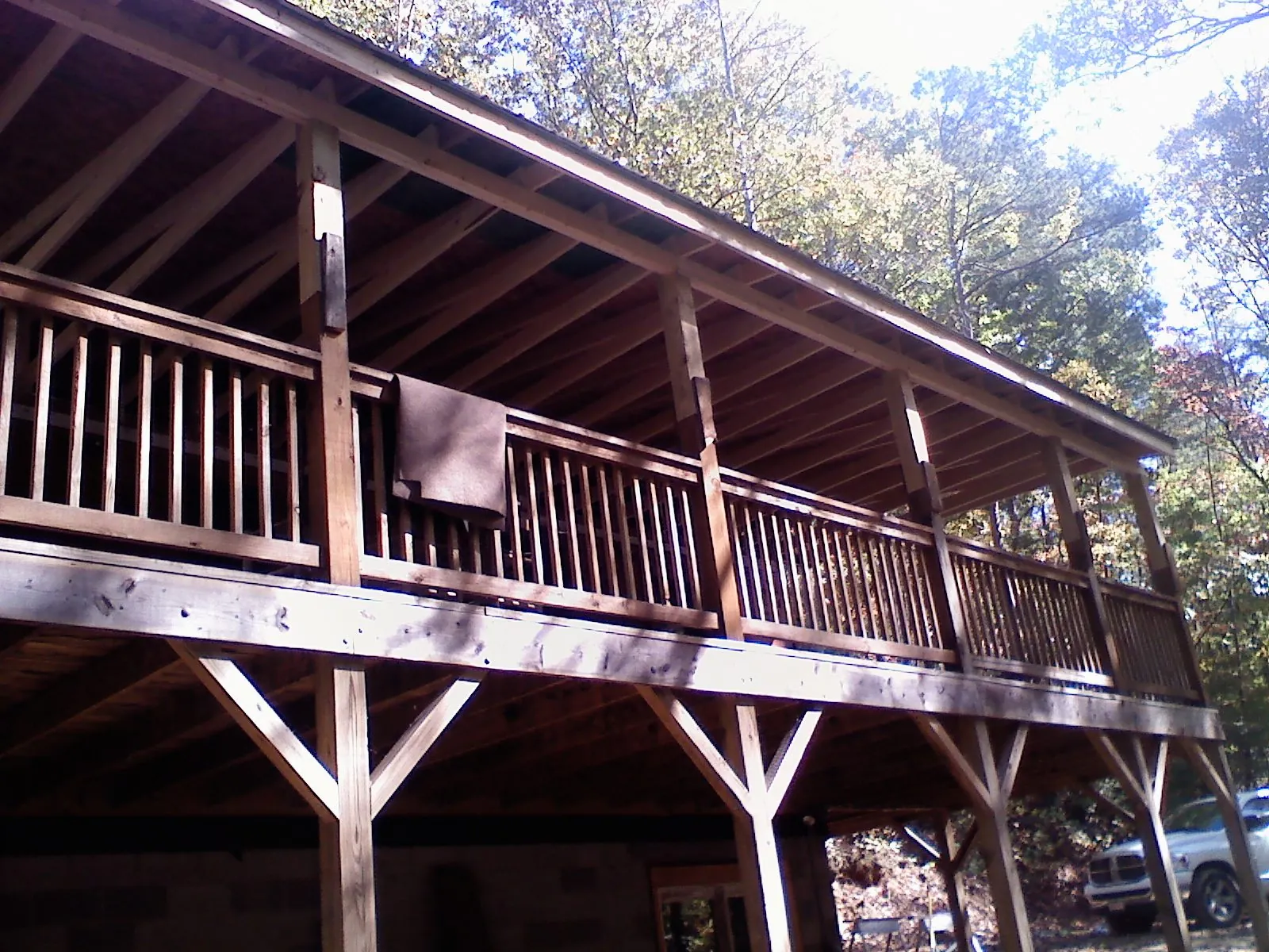 Timber framing under a new elevated porch and deck — Roof Leak Repair in Rootstown by Roofing Brothers